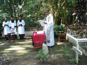 A POEM FOR FATHER POPS.  Father Pol Paracha reads the poem entitled "My Soul's Diary" at the mass in Balindog village, Kidapawan City.  The Diocese of Kidapawan honored their martyrs as they remember the slain Italian missionary Father Fausto Tentorio.  (davaotoday.com photo)  