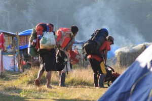 GEARING UP. In Lake Venado, a group of porters gear up for the Mt. Apo summit. They loaded 20-25 kilos of stuff in their packs. (davaotoday.com photo by Rawi June Amaga-Morandante)