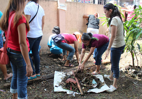 BRIGADA ESKWELA. Parents and guardians clean one of Davao City’s public elementary school, Monday, in preparation for the June opening. According to the Department of Education, 45,000 public primary and secondary schools expect to raise PHP 2 Billion (USD 0.05B) for repairs and improvements. (davaotoday.com photo by Medel V. Hernani)