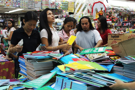 SELLS LIKE HOTCAKES. With the onset of classes, school supplies sell like hotcakes in a Davao City bookstore. (davaotoday.com photo by Medel V. Hernani)