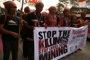 MARCH TO DENR.  Delegates of Manilakbayan (A Journey to Manila) march towards the central office of the Department of Environment and Natural Resources in Quezon City Thursday, December 6.  They called to stop political killings and large-scale mining in Mindanao.   (davaotoday.com photo by Alex D. Lopez)