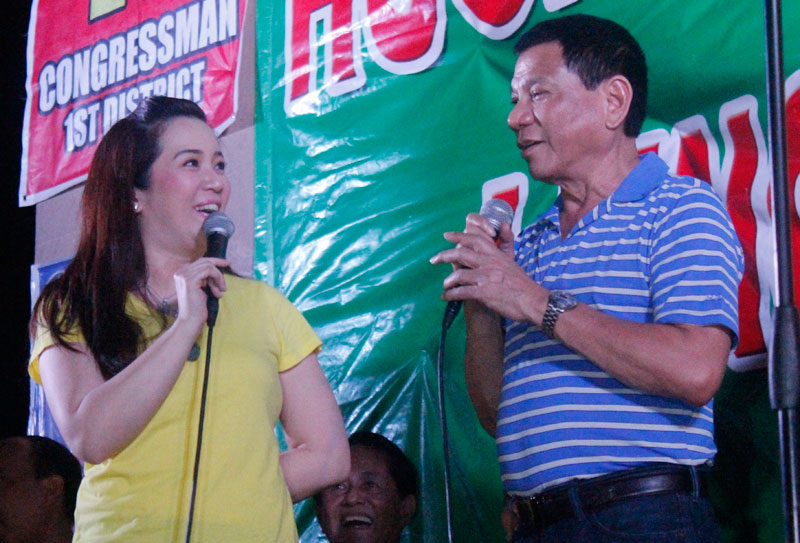 KRIS & RODY. Presidential sister and celebrity Kris Aquino (left) asks Davao City Vice Mayor Rodrigo Duterte’s support for her planned candidacy in the 2016 elections during the campaign rally Thursday night. (davaotoday.com photo by John Rizle L. Saligumba)