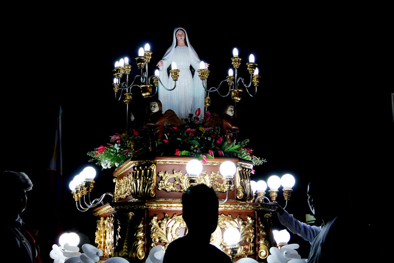 MOTHER OF THE CRUCIFIED CHRIST.  The Statue of the Virgin Mary is being prepared by parish staff in time for the annual Santa Cruzan.  (Contributed photo by Kit Quilla)