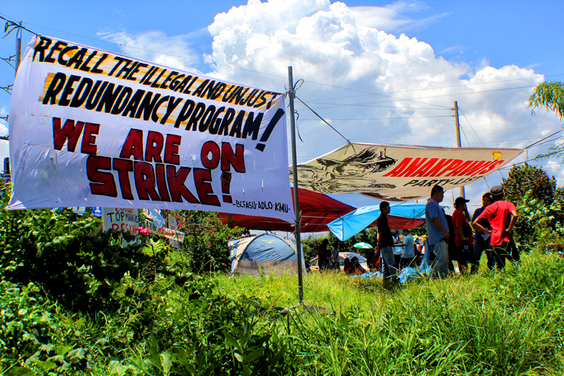 ON STRIKE.  Members and officers of the Brokenshire College Faculty and Staff Union hold a strike Friday after the school management allegedly failed to comply with their Collective Bargaining Agreement and resorted to the “illegal termination” of 11 Clinical Instructors.  (davaotoday.com photo by Ace R. Morandante)   