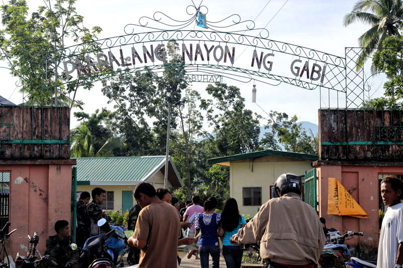 On Monday’s elections, soldiers are staying at the gates of Gabi Central Elementary School in Compostela town, Compostela Valley.  (contributed photo by Kilab Multimedia)