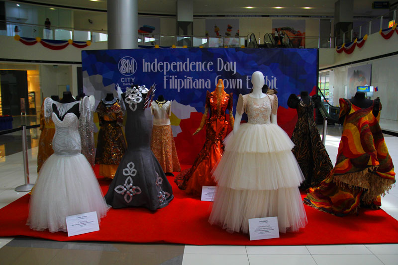 INDEPENDENCE DAY FASHION.  Local couturiers exhibit their version of Filipiniana gowns in SM Ecoland, Davao City, just days before the 115th year celebration of Philippine Independence Day.  (davaotoday.com photo by Ace R. Morandante)