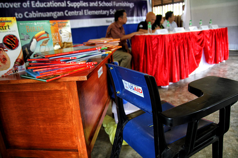 RECOVERY ASSISTANCE.  The United States Agency for International Development turns over school furniture and education supplies worth PHP 1.2 Million to the Cabinuangan Central Elementary School in Cabinuangan village, New Bataan town, Compostela Valley on Friday.  The Pablo-affected school received 1,586 student kits, 53 teacher kits, 53 blackboards, 540 student desks, 12 teacher tables and chairs, reference materials and 53 sets of books.  (davaotoday.com photo by Ace R. Morandante)    