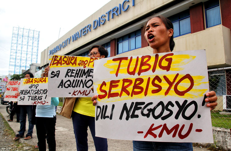 WATER NOT FOR SALE. Women workers voice their opposition to plans of privatizing Davao City Water District in this picket at the DCWD Office in Matina.  Davao's Aboitiz Power Corporation is said to be interested in acquiring DCWD (davaotoday.com photo by Ace Morandante)