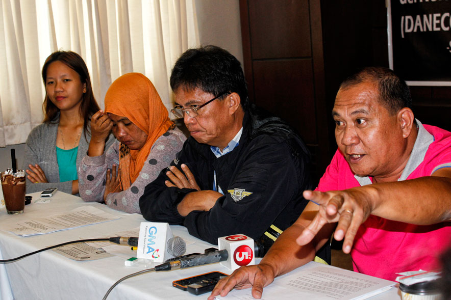 WHO'S PAYING? Rodel Arquiza (right) of Save Daneco Movement raised concerns on the cooperative's P300 million loan for expensive generator sets which he says will be passed on to consumers and cooperative members.  (davaotoday.com photo by Medel V. Hernani)