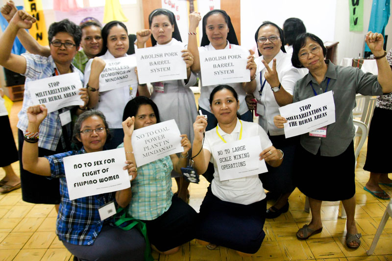 These nuns do their selfie protest against the pork barrel and other issues in Mindanao during the Sisters' Association in Mindanao (SAMIN) 30th anniversary Congress last August 23 to 25 in Benedictine Sisters' Retreat House in Ulas.  Some 80 SAMIN nuns will join Monday's nationwide protests against the pork barrel system. (contributed photo by SAMIN)