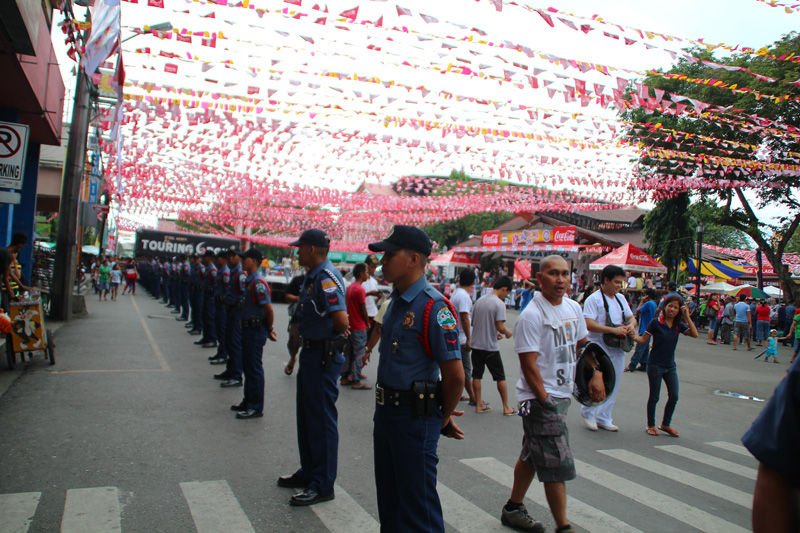 More cops than watchers at the start of the parade along San Pedro Street (davaotoday.com photo by Jandy Lizondra)