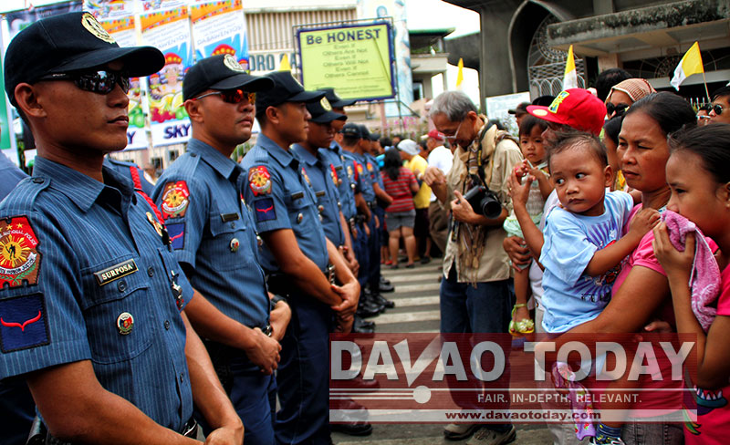 IS THIS A RALLY OR PARADE? Sunday's Pamulak sa Kadayawan Float Parade looked more like a rally with many police flanking the streets to keep off parade watchers from coming near the streets. (davaotoday.com photo by Jandy Ken C. Lizondra)