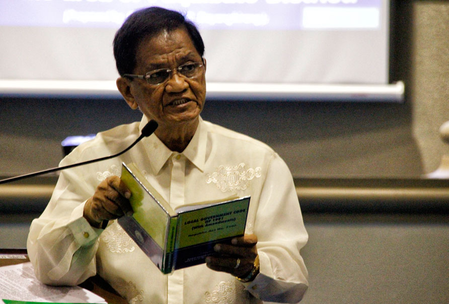 LECTURE First District Councilor Atty. Melchor Quitain reads the Local Government Code during Tuesday’s City Council session to remind fellow councilors on the local government’s capacity to stop mining in the city. (davaotoday.com photo by MEDEL V. HERNANI)