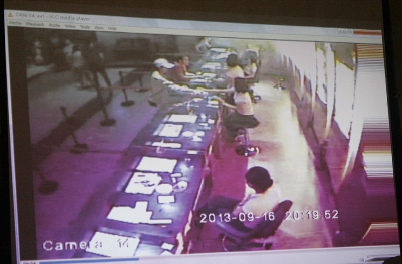 Gaisano Mall Cinema's CCTV shows suspect (in cap) buying a ticket on Monday, 8:19 pm, an hour before the explosion occured. (davaotoday.com photo by Medel V. Hernani)