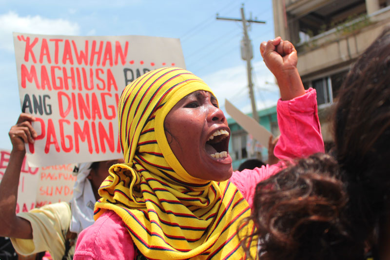 Compostela farmer shouts her opposition to San Miguel mining her town. (davaotoday.com photo by Ace R. Morandante)