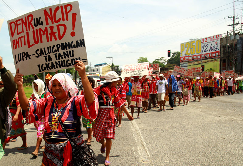LUMADS PICKET LOGGING FIRM Hundreds of Ata-Manobos from Talaingod, Davao del Norte marched at the office of logging firm Alcantara & Sons in Lanang, Davao City Wednesday to protest the company’s Integrated Forest Management Agreement, which they said is a commercial logging venture encroaching their ancestral domain. (davaotoday.com photo by Ace R. Morandante)