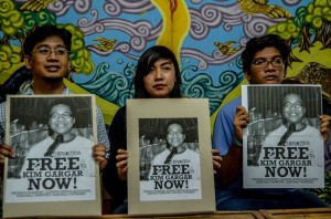 RELEASE KIM GARGAR Kim Gargar's sister (center) and colleagues from the scientist group AGHAM demand for his immediate release, as they slammed the illegal arrest and vilification by the Philippine Army against the scientist. (contributed photo)