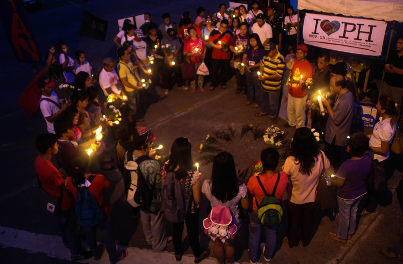 DAVAO PRAYS FOR VISAYAS Church people and progressive groups converged at Freedom Park on Wednesday night as they offer prayers for Typhoon Yolanda victims.  The groups also gathered cash and other donations which they will bring to Leyte next week through the Lihok Katawhan coalition. (davaotoday.com photo by Ace R. Morandante)