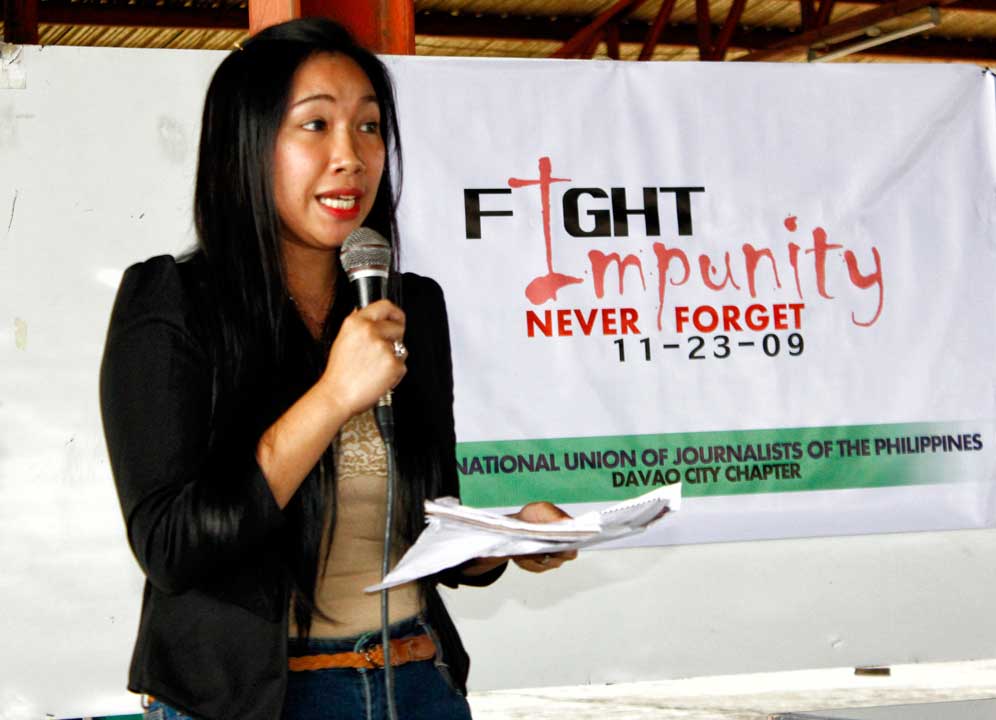 ASPIRING JOURNALIST SPEAKS OUT A mass communication student gives her opinion on the role of media in reporting human rights issues during Friday's forum workshop launched by the National Union of Journalists of the Philippines as part of commemorating the fourth year  of the Ampatuan massacre and the third year of the International Day to End Impunity. (davaotoday.com photo by Medel V. Hernani)