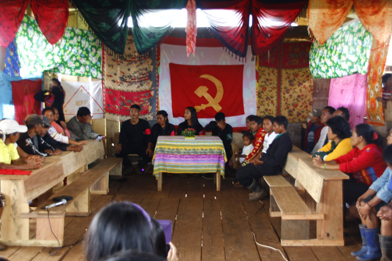 MASS WEDDING. Three couples take part in a Kasalang Bayan conducted during the 45th anniversary of Communist Party of the Philippines in a Compostela Valley guerilla base. (Earl Condeza/davaotoday.com)