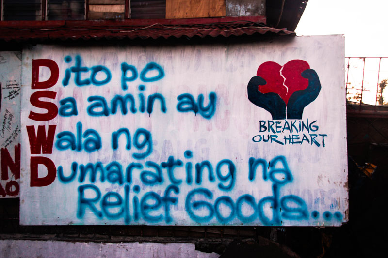RENAMING DSWD. Residents at Tacloban City express their frustration for not receiving any relief goods from the government even as three months have passed since Typhoon Yolanda swept the city. This picture was taken during a rehabilitation mission by Balsa Mindanao last week. (Earl Condeza/ davaotoday.com)