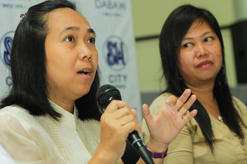 DAVAO SET FOR INT'L WOMEN'S DAY. Women rights advocates announce activities for the coming International Women's Day. From left is Lorna Mandin from the city government's Integrated Gender Development Division and Mae Ann Sapar of Gabriela Southern Mindanao Chapter. (Ace R. Morandante/davaotoday.com)
