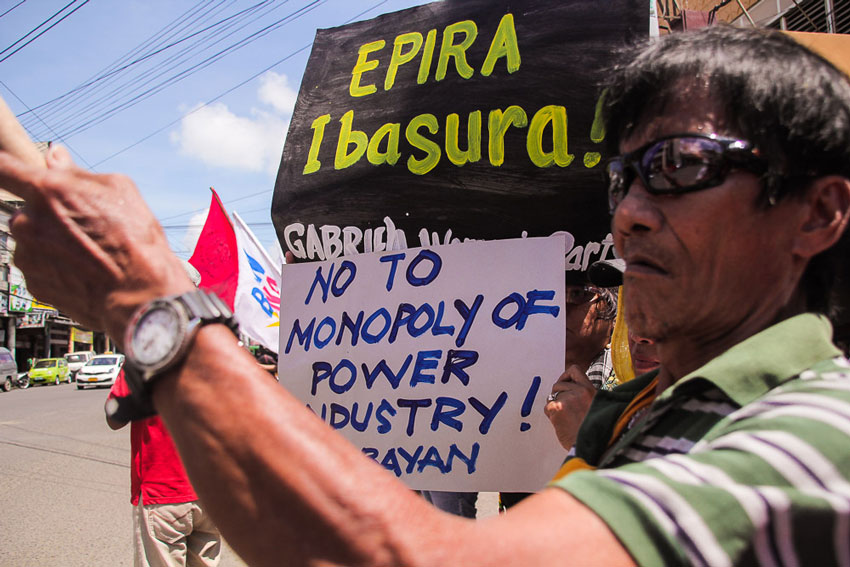 Activists staged a picket at Davao City's Department of Energy regional office along Magsaysay Avenue in protest of the 13th year Electric Power Industry Reform Act that has hiked power rates and privatized production of power in Mindanao.