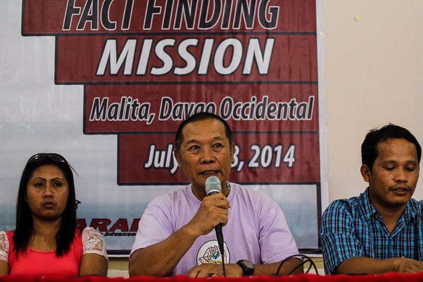 Karapatan Task Force Malita head Lordino Guatero (middle) present their fact-finding report on the murders of two farmers last week in Malita, Davao Occidental - Tony Bago and Arnel Tanduya - whom they said were victims of the military’s red-tagging campaign. 