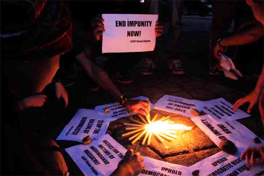 Campus journalists mark the 56th month commemoration of the Maguindanao massacre during the opening of the Press Freedom Week.  