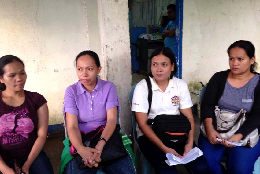 The wives of the four police officers taken as prisoner of war by the New Peoples Army (NPA). (photo from Facebook of Bp. Rhee Timbang, used with permission)