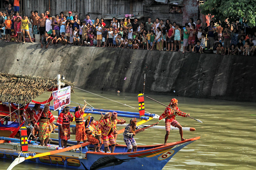 Matigsalug tribal members show their bountiful harvest of crops and fruits during the Subang sa Sinugdanan, a river festival at the Bankerohan River. The Matigsalugs are known to reside along the river banks.