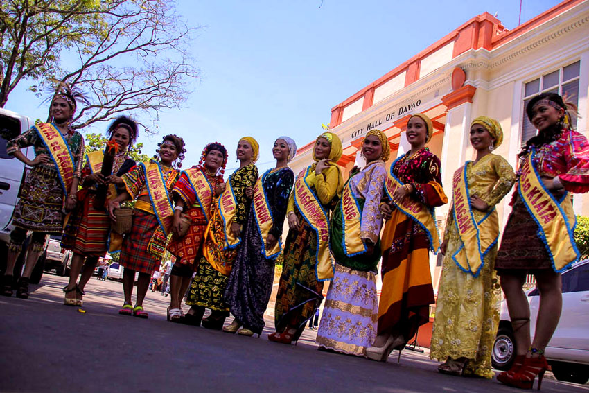 Candidates pose outside the City Hall building of Davao City. (L to R) Liezel Mae O. Anac 19, (Tagabawa-Bagobo), Susan M. Batawan, 20 (Ata), Noteza M. Nogan, 20 (Obu-Manuuvu), Chally Lou A. Lacaran, 24, (Matigsalog), Cesa Mae K. Tangkih, 24 (Sama), Bai Mina A. Elatan, 20, (Iranun), Bai Azmyelah M. Latip, 19 (Maguindanao), Fahmia E. Basari, 18 (Tausog), Hida-Ya B. Polao, 21 (Maranao), Amiel T. Lubama, 21 (Kagan) and Kessia Carol D. Tar, 18 (Bagobo-clata). They will compete for the Hiyas ng Kadayawan crown on August 15 at 7:30 pm at the Davao Recreation Center.