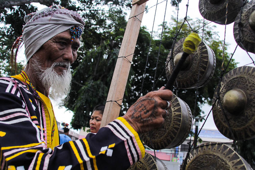  An Uvu-Manobo plays his Kulintang instrument at the Rizal Park during the  opening of the 29th Kadayawan Festival.