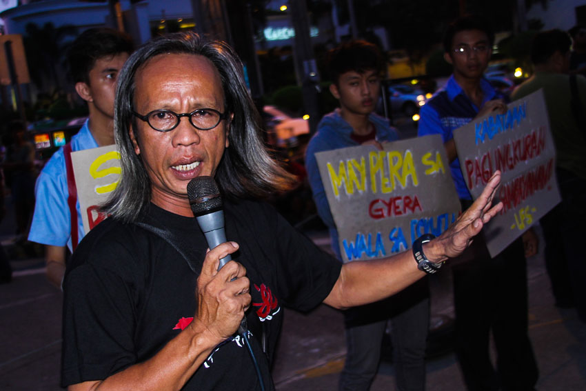 Former League of Filipino Students leader,  Alexander Rocky Balili, gives a solidariy message to the group's 37th year anniversary commemoration a the People's Park in Davao City. 