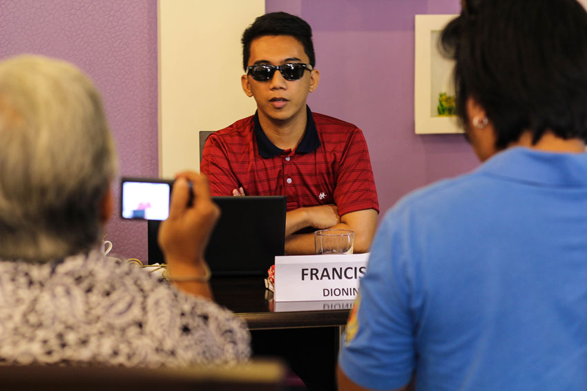 Francis Muya laments over the arrest of his father Dominiciano, who he described as a good provider .(Ace R. Morandante/davaotoday.com