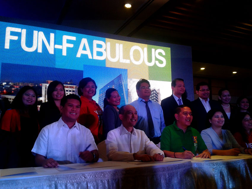 DAVAO TO BOOST TOURISM IN 2015. City hotel and resort owners joined the launch of the Visit the Philippines 2015 campaign of the Department of Tourism at the Marco Polo Hotel on Wednesday with (seated from left) City Councilor Al-Ryan Alejandre,; Domingo Enerio III, chief operating officer of the Tourism Promotions Board; and Tourism Assistant Secretary Art Boncato. (Tyrone A. Velez/davaotoday.com)