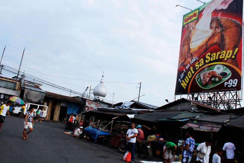 HOLIDAY. Government declared a regular holiday for Eid al-Adha (Feast of Sacrifice), Monday. As Muslims celebrate the feast worldwide, life in Bankerohan public market goes on for some Davaoenos (Medel V. Hernani/davaotoday.com).