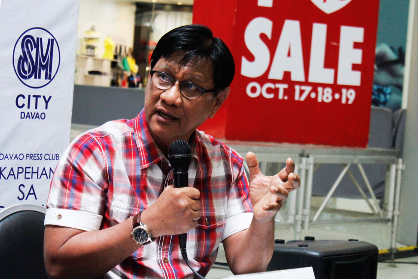 Ret.Col. Yusof Jimlani, Davao City Drainage Maintenance Operation Chief warns night market vendors to refrain from throwing garbage in Roxas canal and remove their "ukay-ukay" stocks including their tents along the street during daytime to prevent traffic congestion (Medel V. Hernani/davaotoday.com)