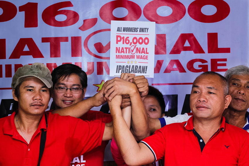 WORKING CLASS UNITY. Kilusang Mayo, along with the Confederation for Unity, Recognition and Advancement of Government Employees (COURAGE), lock arms to pursue the campaign on raising the national minimum wage to P16,000.(Ace R. Morandante/davaotoday.com)