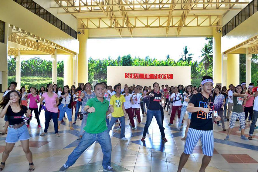 UP Mindanao students dance with actress and activist Monique Wilson to support One Billion Rising Revolution, a global call to end violence against women.