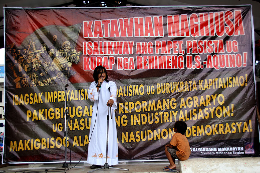 A street child listens to the speech delivered by Fr. Arsen Maseg-eng of the Missionary of Jesus Christ during a program in Davao City to commemorate the 66th International Human Rights day. (Ace R. Morandante/davaotoday.com