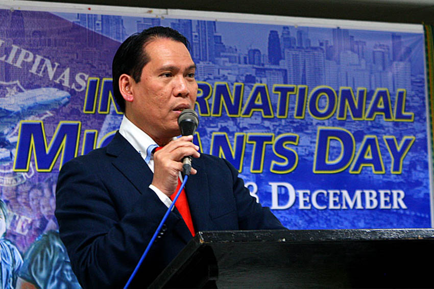Overseas Workers Welfare Administration (OWWA) regional director, Eduardo Bellido speaks about global disease outbreaks and its implications to Filipino migrants during a forum commemorating the International Migrants' Day held at the Ateneo de Davao University, Thursday. (Hanz Realista Garado/davaotoday.com)