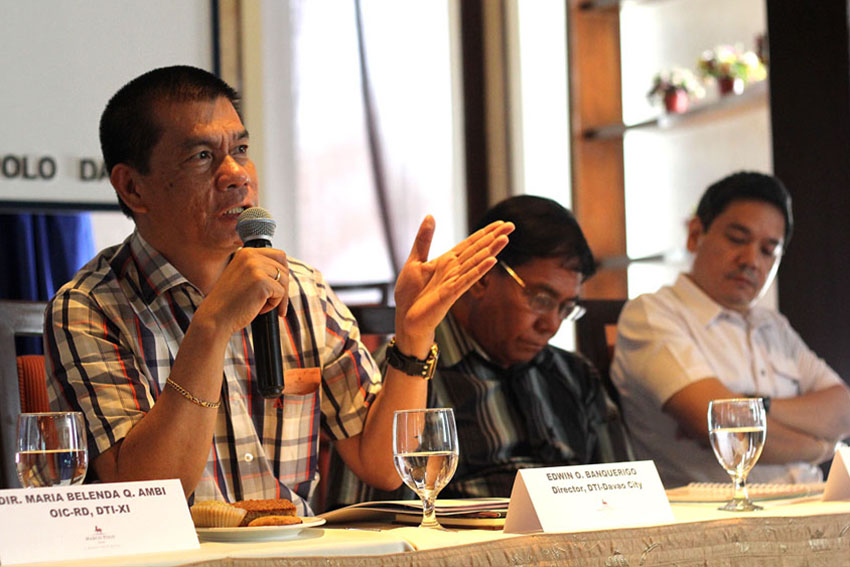 Department of Trade and Industry city director, Edwin O. Banquerigo, along with other DTI provincial directors of Davao del Sur, Compostela Valley Province, and Davao Oriental, shares their accomplishment report during the DTI Media Interface held at Marco Polo Hotel, Friday. (Ace R. Morandante/davaotoday.com)