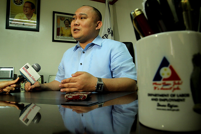 Atty. Joffrey Suyao, regional director of the Department of Labor and Employment XI tells the media that they are just an implementing agency and can do nothing on the workers' demands. (Ace R. Morandante/davaotoday.com)