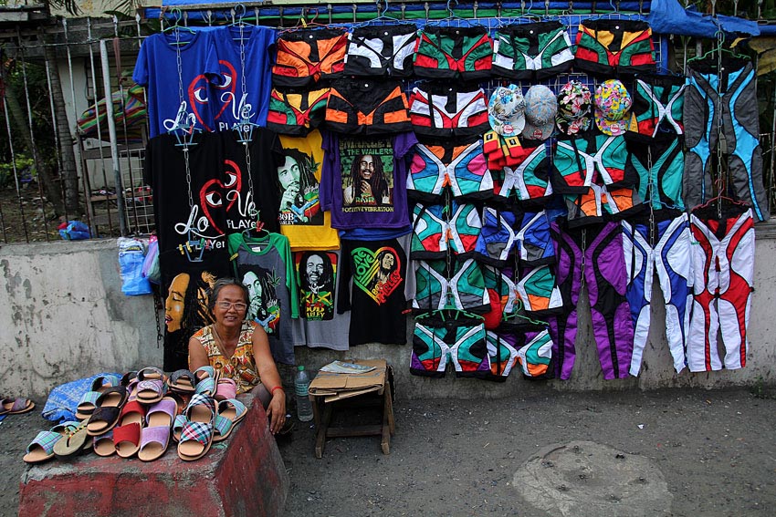 Meldred Dechosa, 58 years old sells her handmade sandals and trekking shorts displayed along Claveria St, outside San Pedro church. (Ace R. Morandante/davaotoday.com)