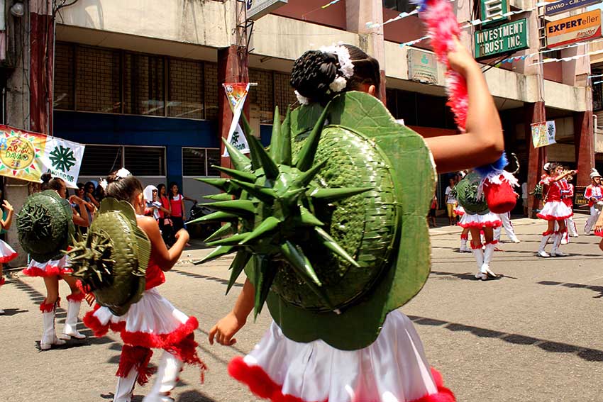 Students wear Durian-like props at their back during their dance on the 78th Araw Ng Dabaw celebration. (Medel V. Hernani/davaotoday.com)