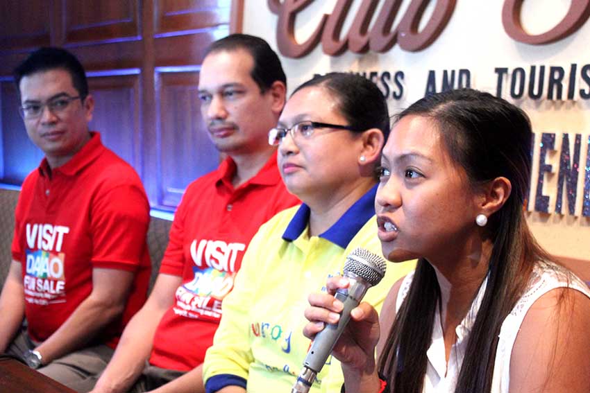 AIR ASIA marketing manager, Len Carcam,(right with microphone) gives assurance of good service to passengers during the Visit Davao Tours in a media forum on Wednesday. (Medel V. Hernani/davaotoday.com)