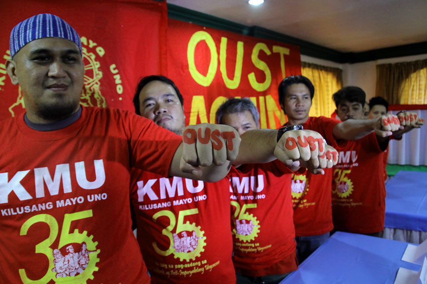 Leaders of various unions in Davao City call for President Aquino's ouster. Here they pose with their closed fists as they are set to deliver hard blows against the Labor Export Policy of the Aquino administration on Labor Day this Friday. (Ace R. Morandante/davaotoday.com)