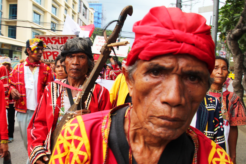 Hundreds of indigenous peoples from five different regions in Mindanao march from the regional office of the Mines and Geosciences Bureau to Freedom Park to protest against large scale mining inside ancestral domain. The activity commemorates the celebration of Earth Day. (Ace R. Morandante/davaotoday.com)