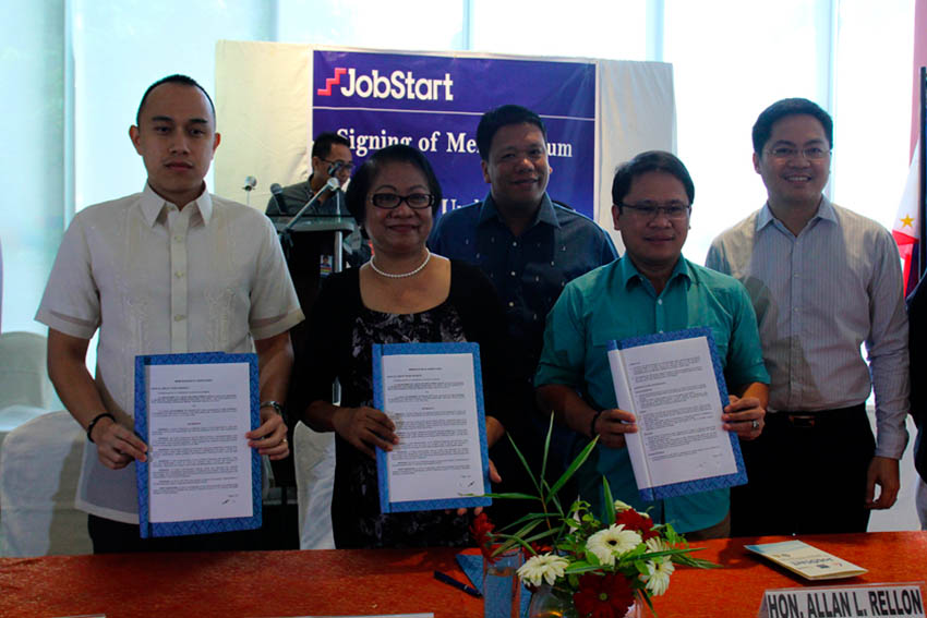 The Department of Labor and Employment and the city governments of Davao and Tagum signed a memorandum of understanding for DOLE's latest program to cut down the rising unemployment rate among the youth in the country. The two cities were identified as the sites for the second wave of the JobStart Philippines program. From left to right: Assistant City Administrator Atty. Tristan Dwight P. Domingo, Labor Secretary Rosalinda Dimapilis-Baldos, Assistant Regional Director Dole XI Atty Jason P. Balais, Tagum City Mayor Allan Rellin and First District Congressman Karlo Alexei B. Nograles of the Committee on Labor. (Ace R. Morandante/davaotoday.com)